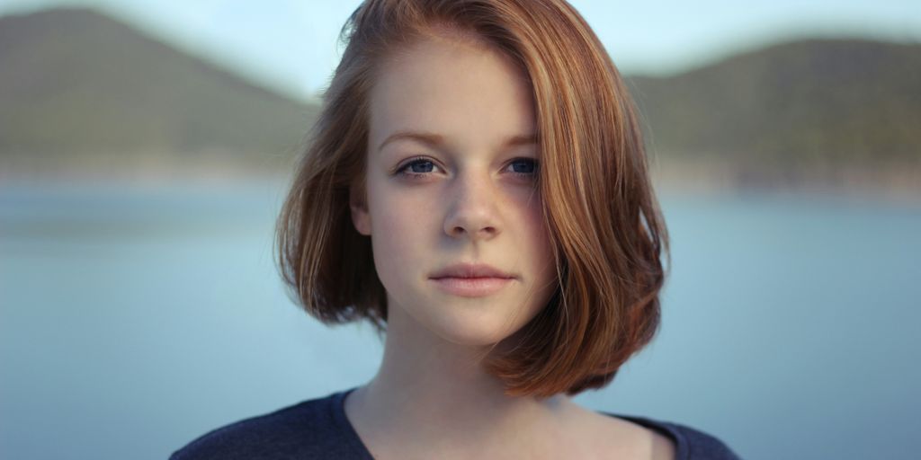 shallow focus photography of woman outdoor during day