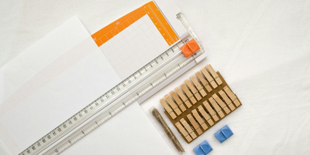 clear acrylic ruler on white paper