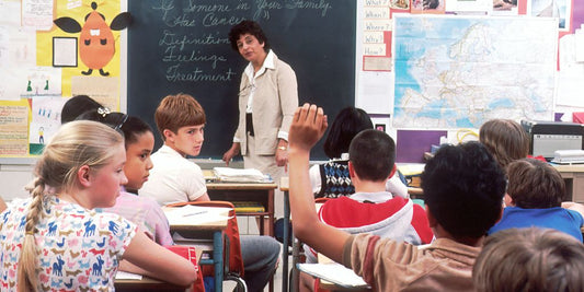 woman standing in front of children