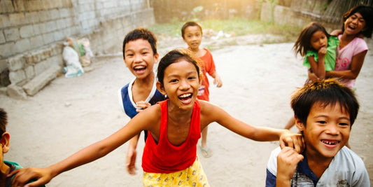 group of children laughing together